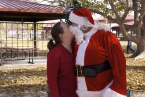 I believe in santa clause kissing